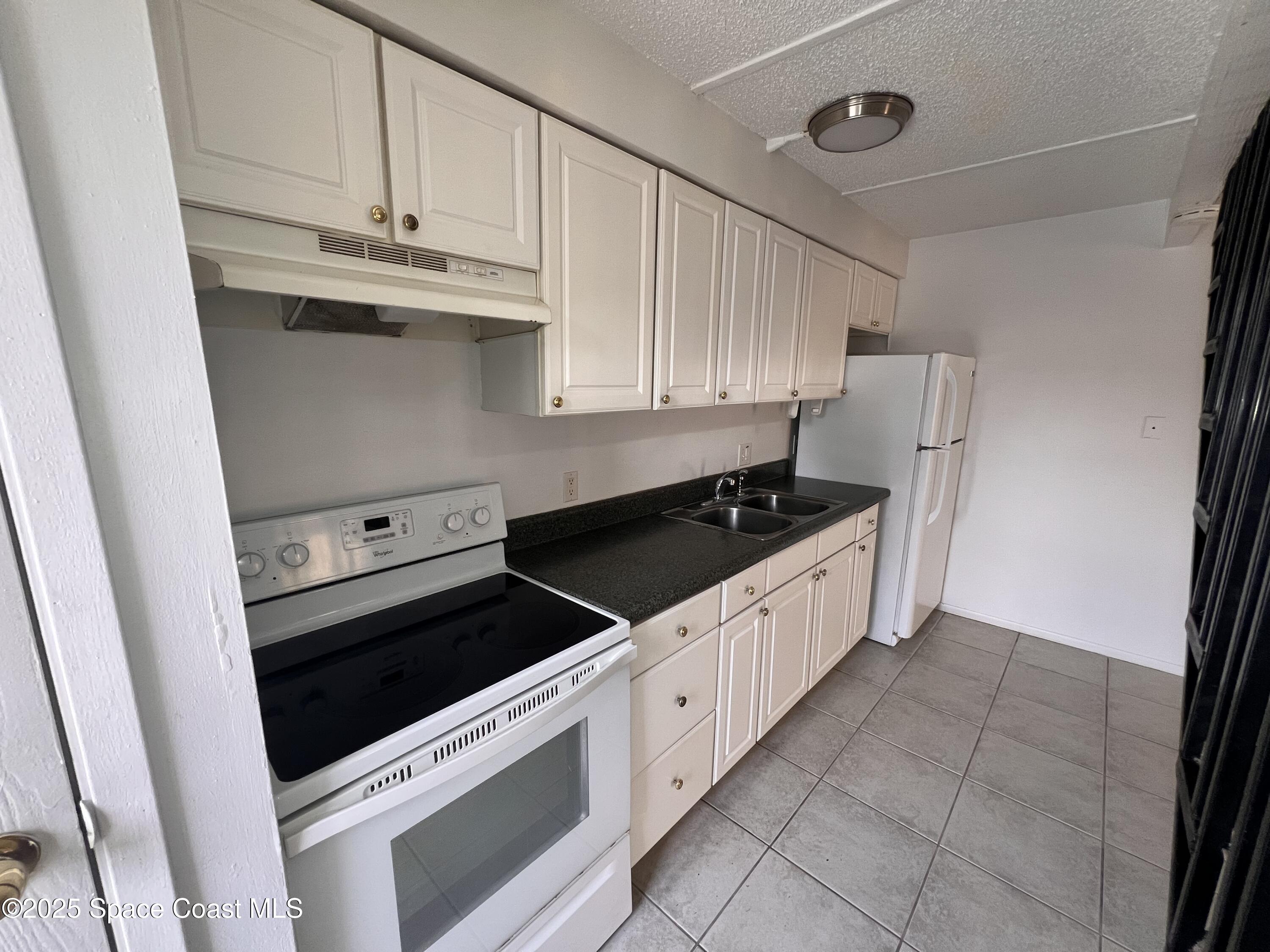 3818 Overlook Drive, Unit 42 Palm Bay, FL 32905 - Photo 4 of 8 IMG_9313