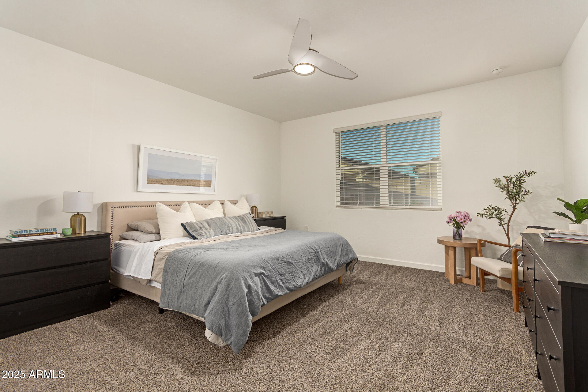 3274 West Stradling Avenue Apache Junction, AZ 85120 - Photo 14 of 35 a bed room with a bed and a chair