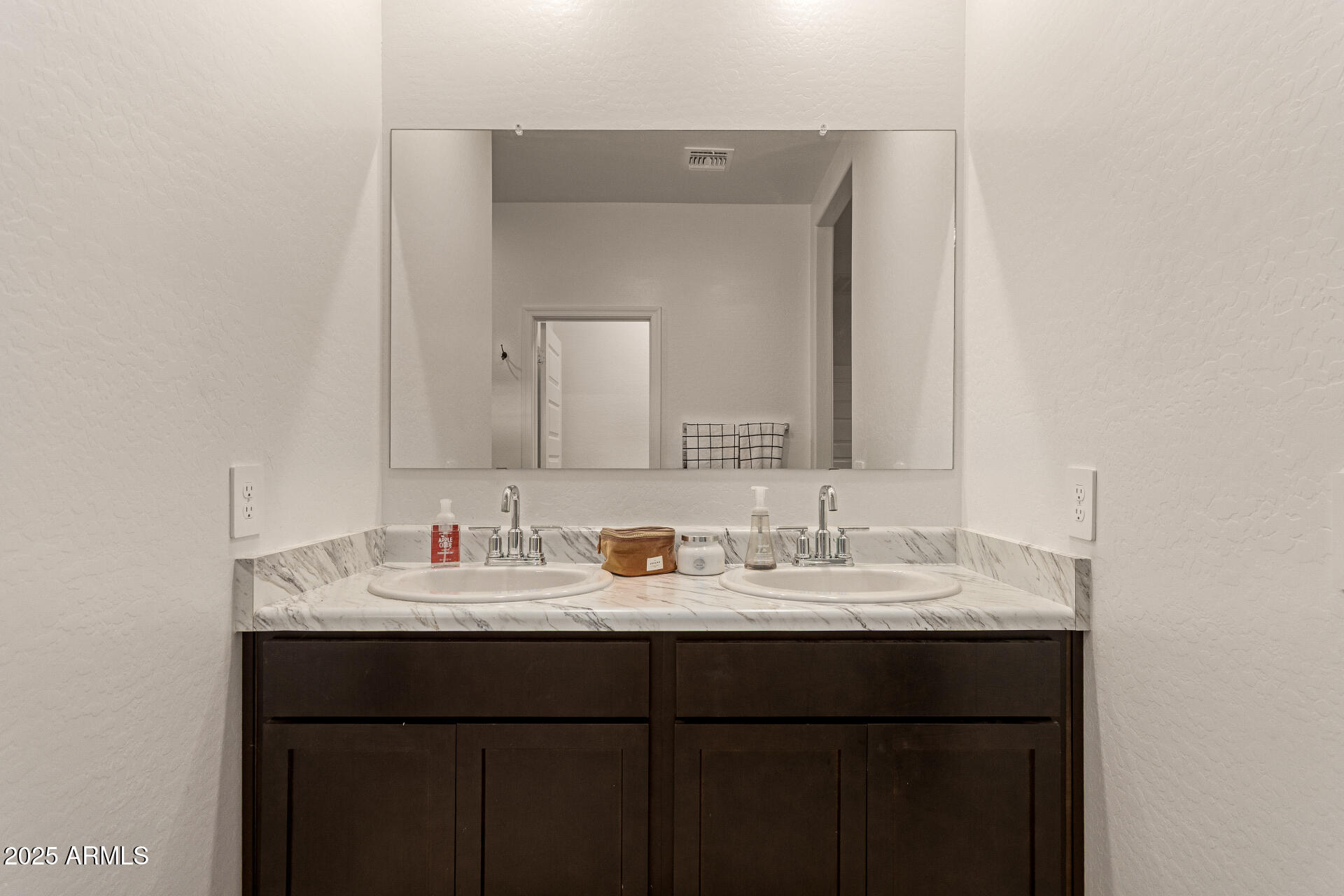 3274 West Stradling Avenue Apache Junction, AZ 85120 - Photo 18 of 35 a bathroom with a sink and a mirror