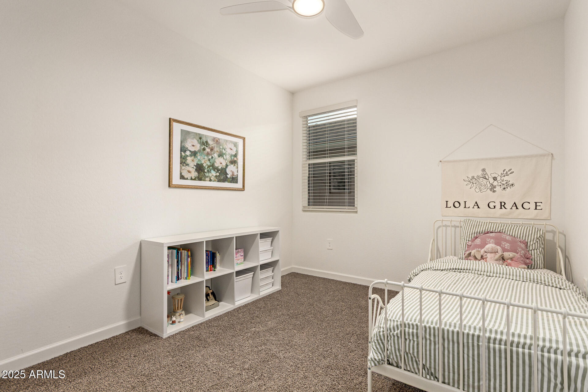 3274 West Stradling Avenue Apache Junction, AZ 85120 - Photo 24 of 35 a bedroom with a bed and a window