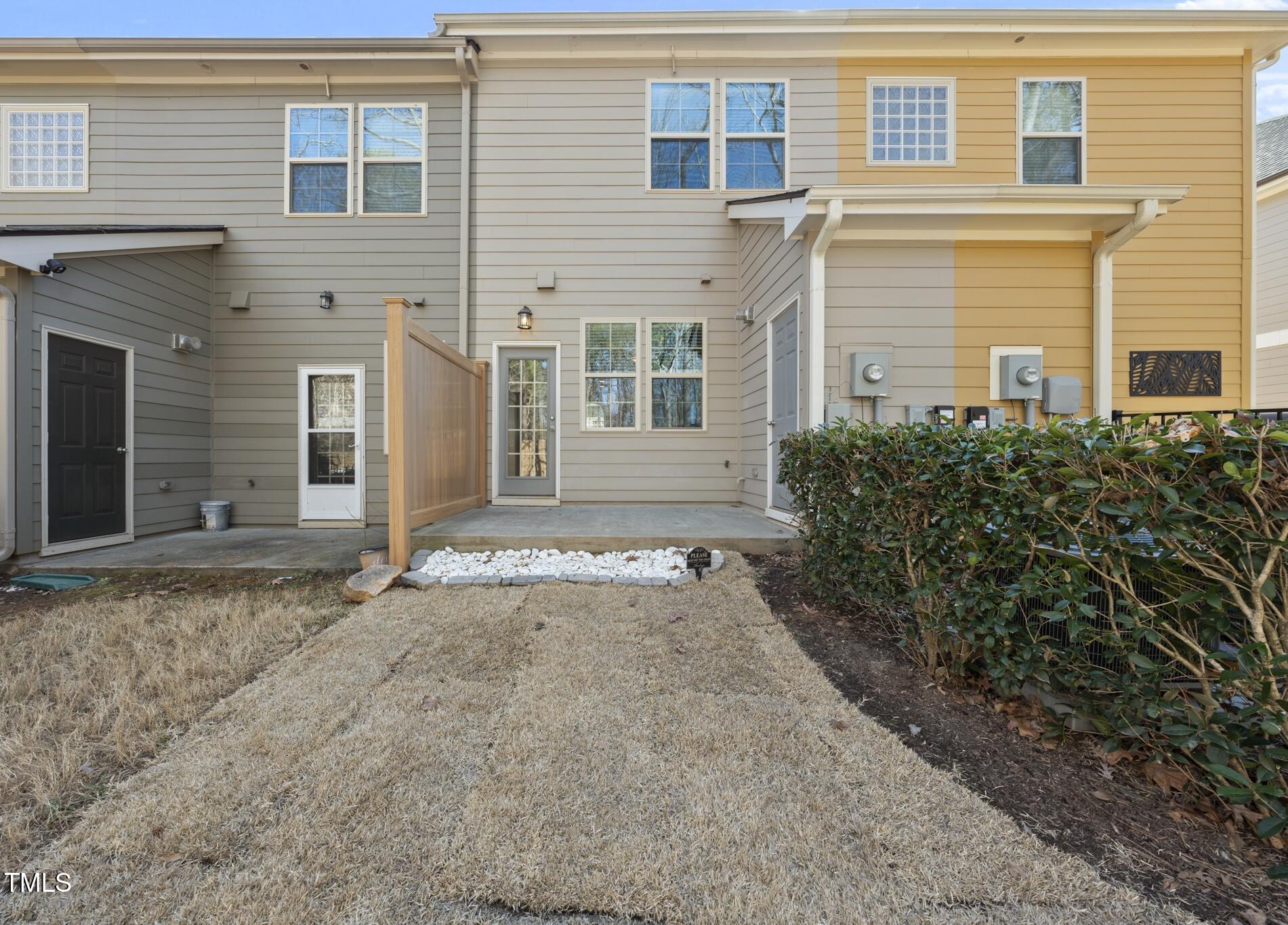684 Wickham Ridge Road Apex, NC 27539 - Photo 14 of 18 front view of a house with a yard