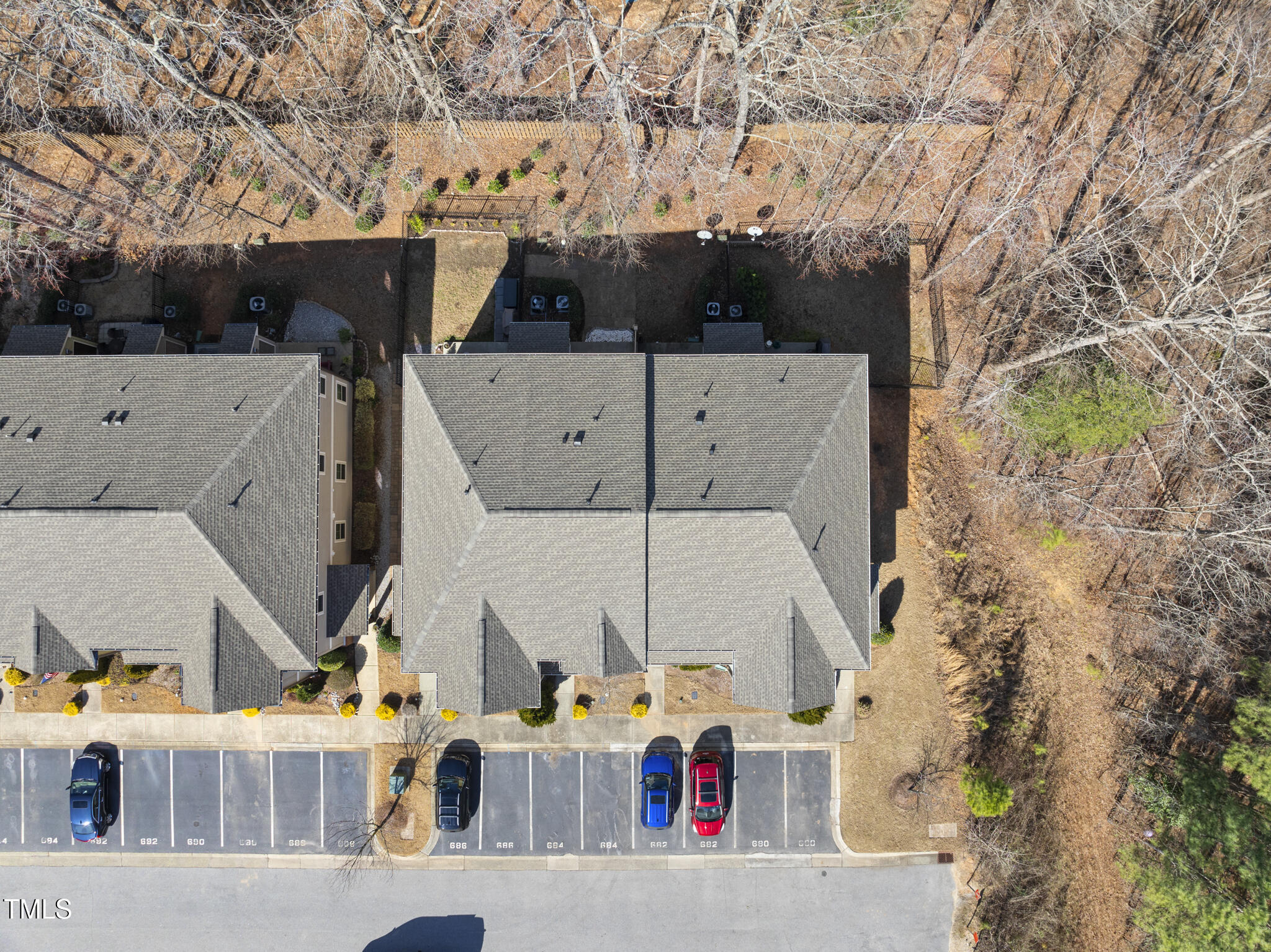 684 Wickham Ridge Road Apex, NC 27539 - Photo 15 of 18 an aerial view of a house with large trees