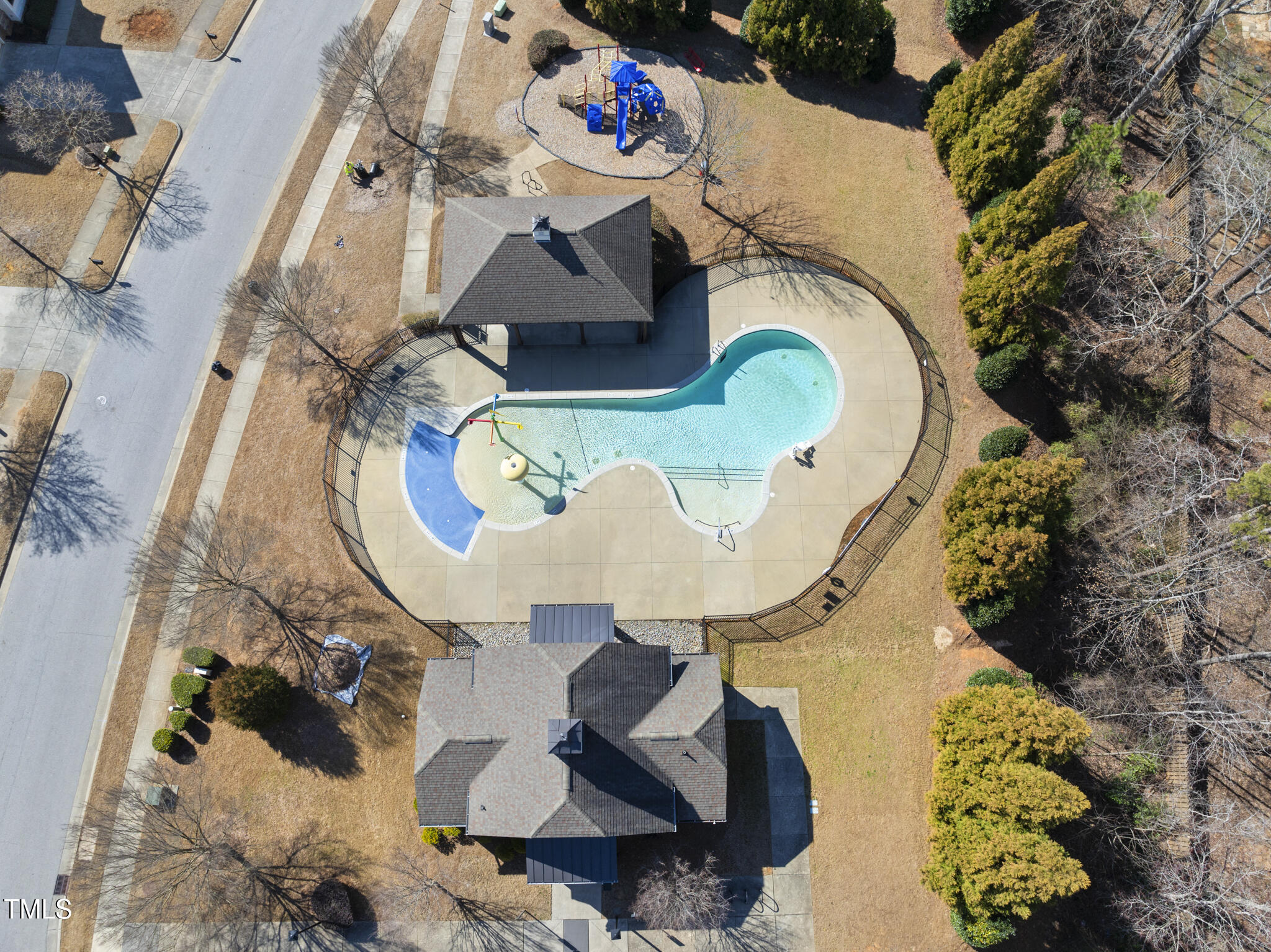 684 Wickham Ridge Road Apex, NC 27539 - Photo 16 of 18 an aerial view of a house with a swimming pool