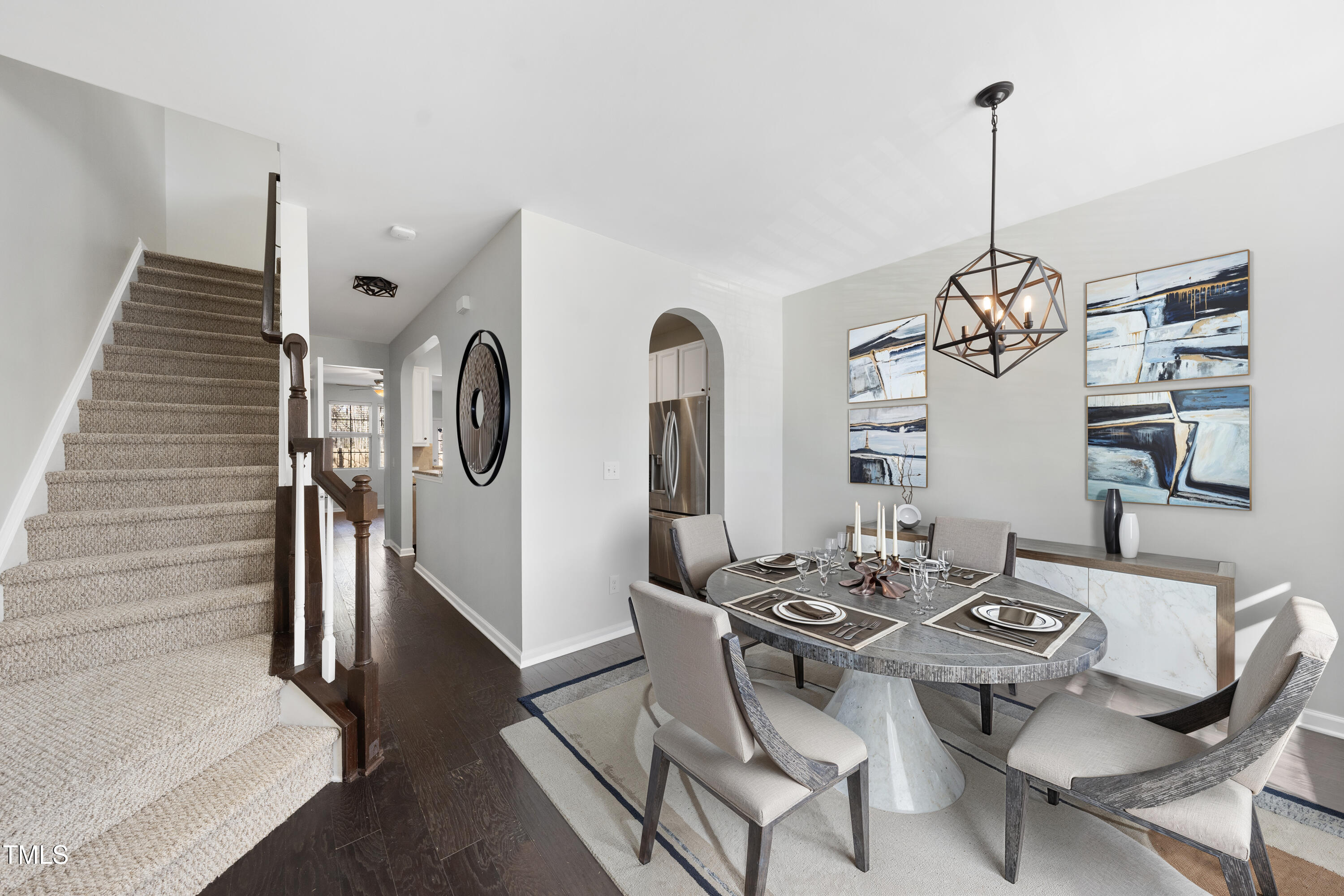 684 Wickham Ridge Road Apex, NC 27539 - Photo 2 of 18 a dining room with furniture and window