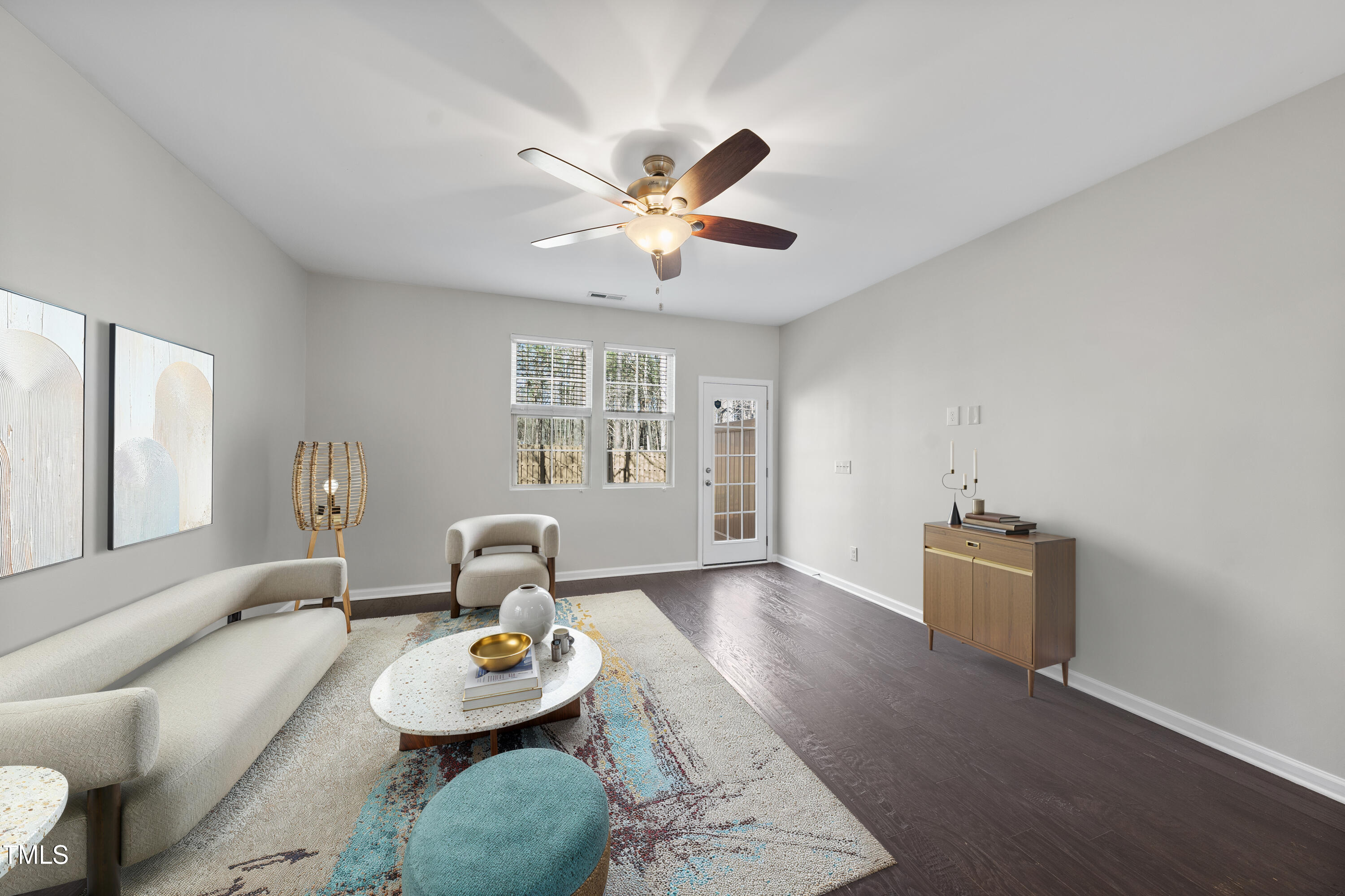 684 Wickham Ridge Road Apex, NC 27539 - Photo 7 of 18 a living room with furniture and a window