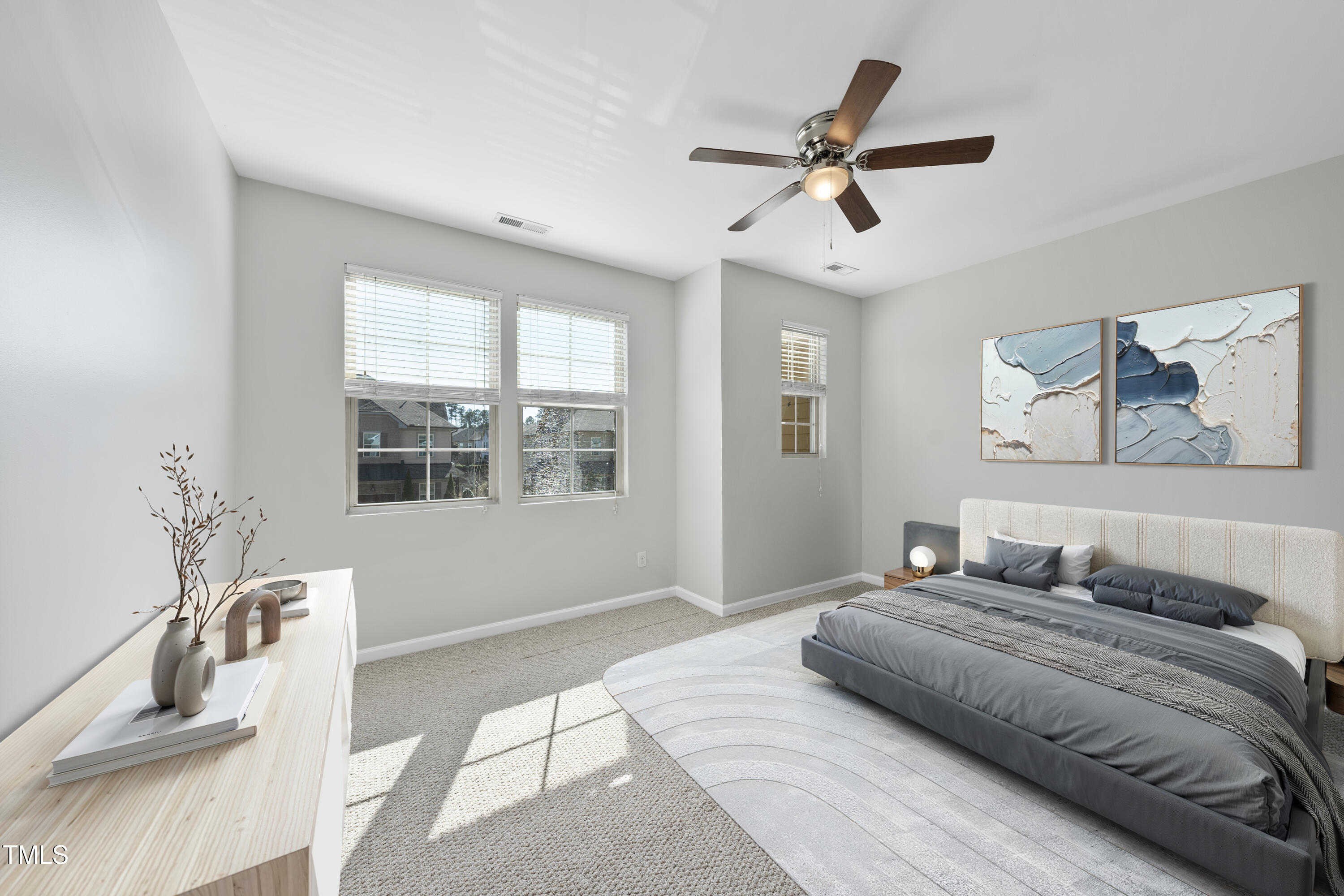 684 Wickham Ridge Road Apex, NC 27539 - Photo 8 of 18 a bedroom with a large bed and a window