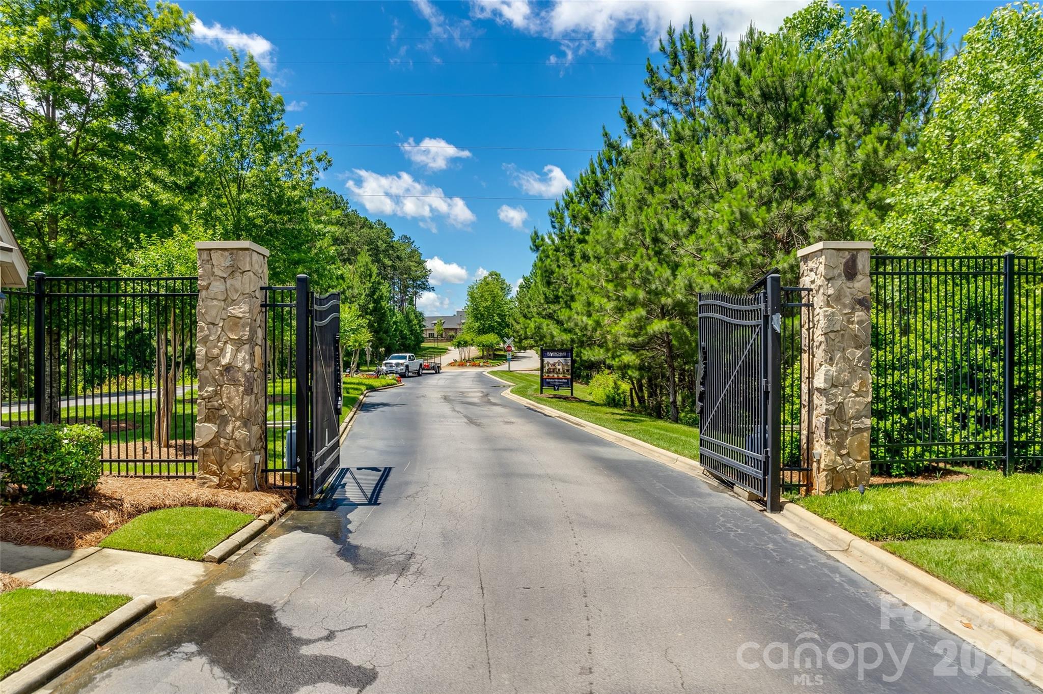 6121 Chimney Bluff Road, Unit 6 Lancaster, SC 29720 - Photo 12 of 25 a view of a street with a large trees