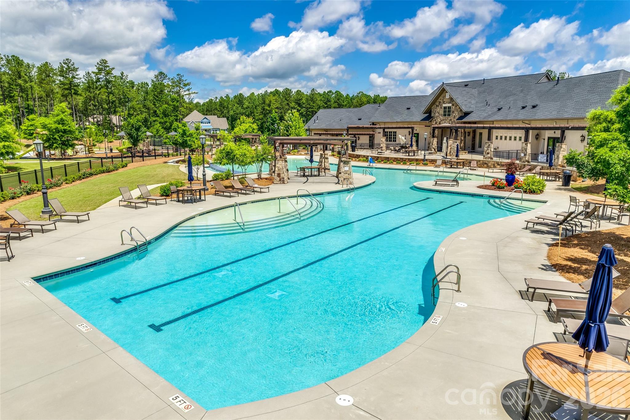 6121 Chimney Bluff Road, Unit 6 Lancaster, SC 29720 - Photo 19 of 25 a view of a swimming pool with a patio