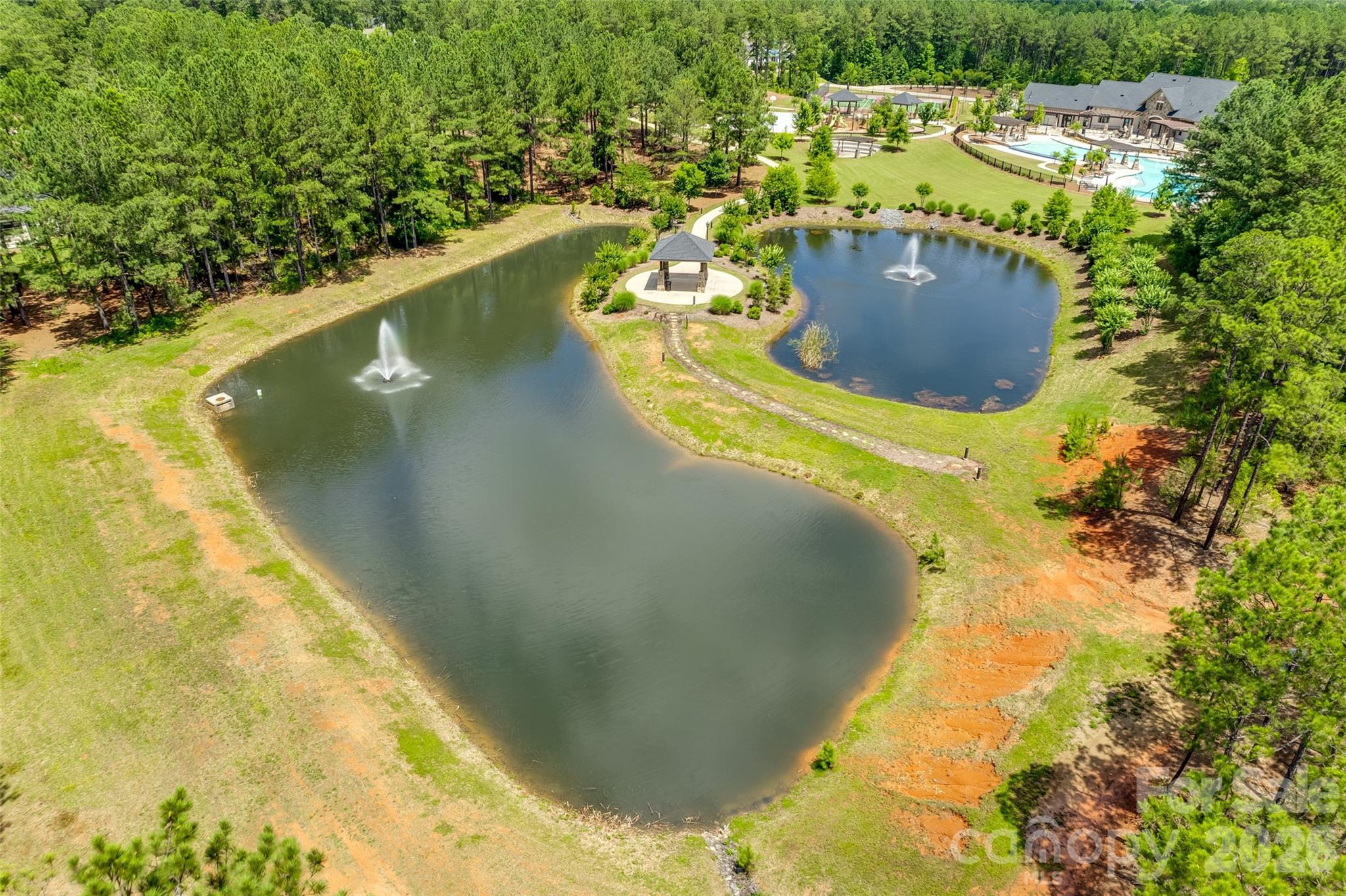 6121 Chimney Bluff Road, Unit 6 Lancaster, SC 29720 - Photo 23 of 25 a view of a swimming pool with a yard