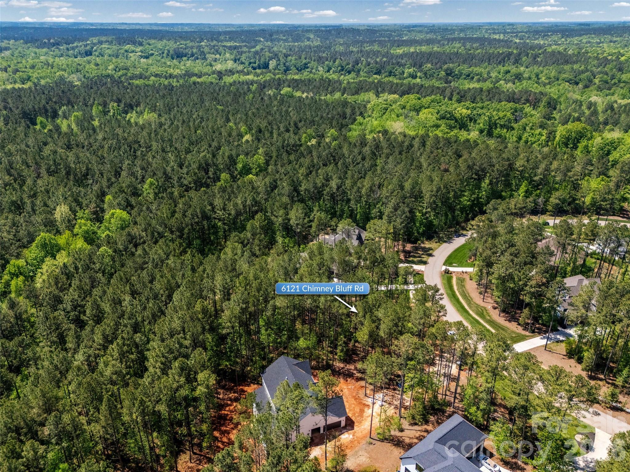 6121 Chimney Bluff Road, Unit 6 Lancaster, SC 29720 - Photo 6 of 25 a view of a forest with a park