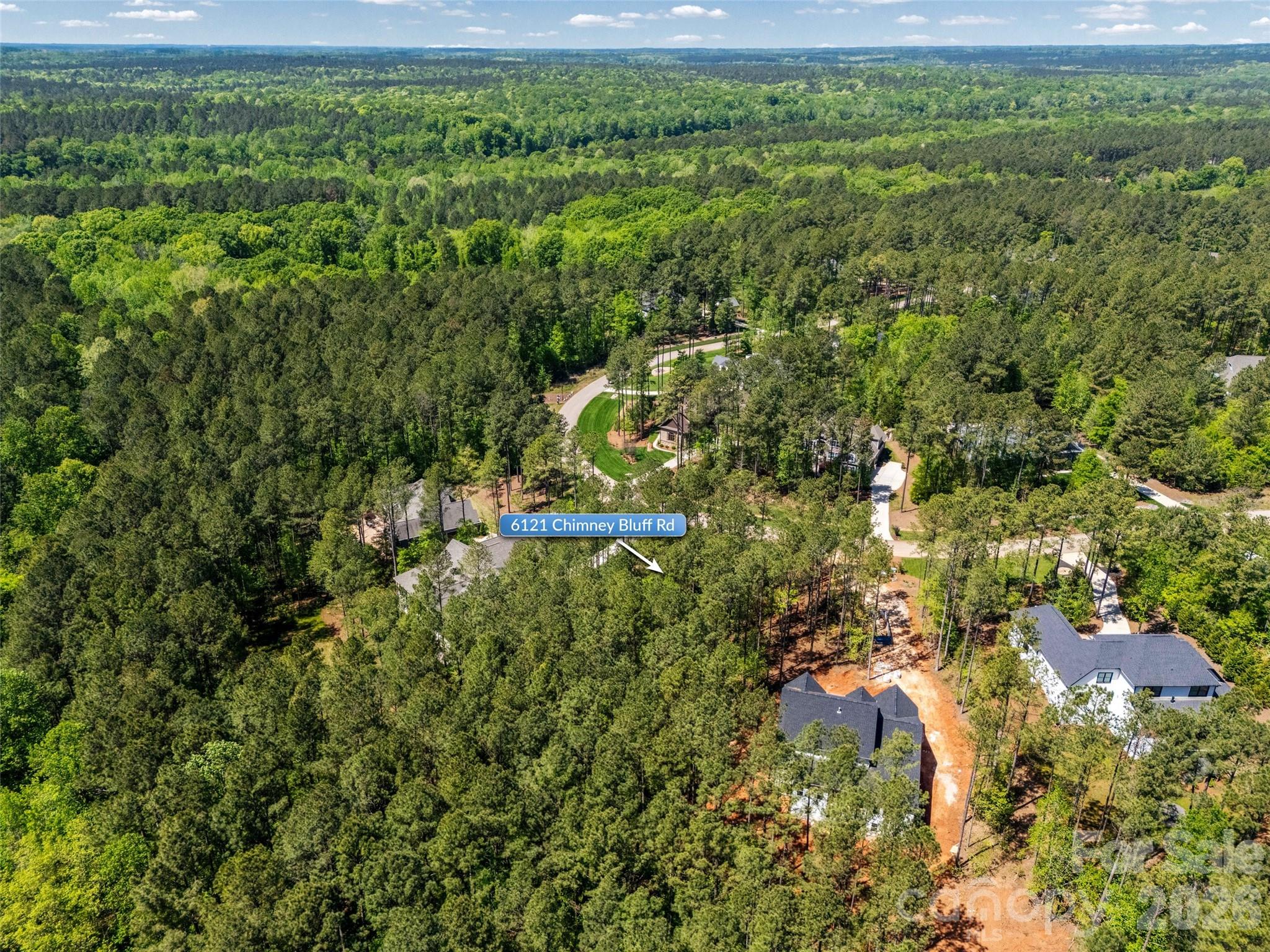 6121 Chimney Bluff Road, Unit 6 Lancaster, SC 29720 - Photo 7 of 25 a view of a garden with an outdoor space