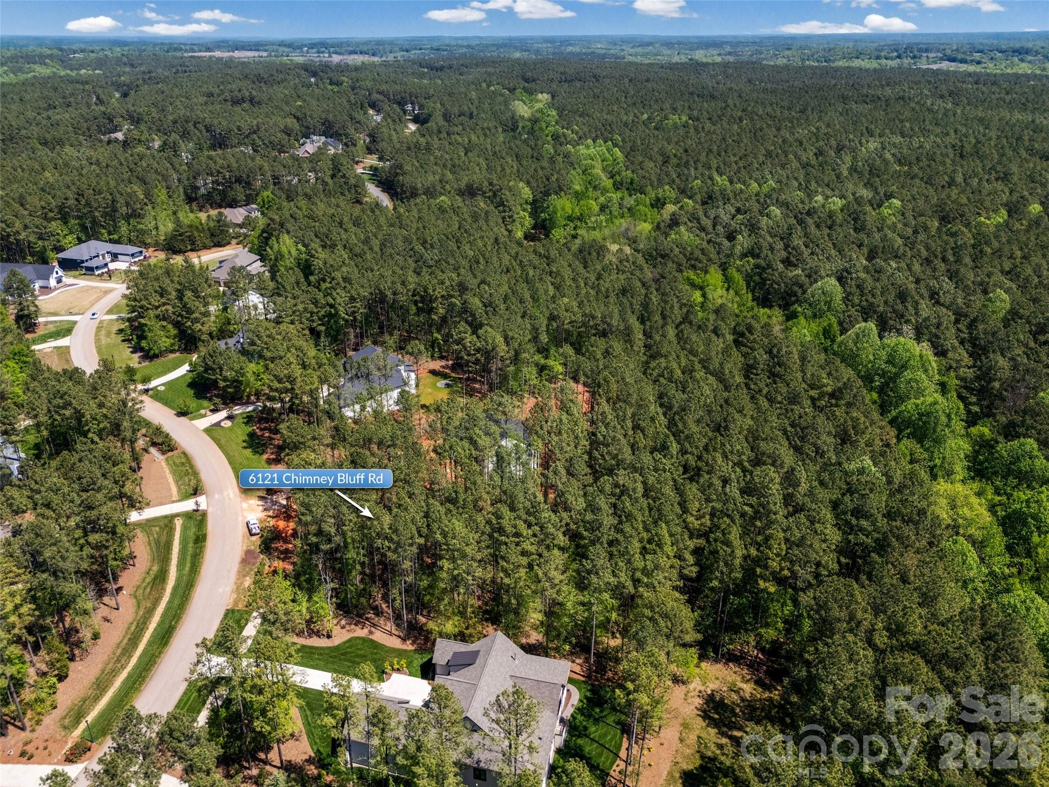 6121 Chimney Bluff Road, Unit 6 Lancaster, SC 29720 - Photo 10 of 25 a view of a houses with yard