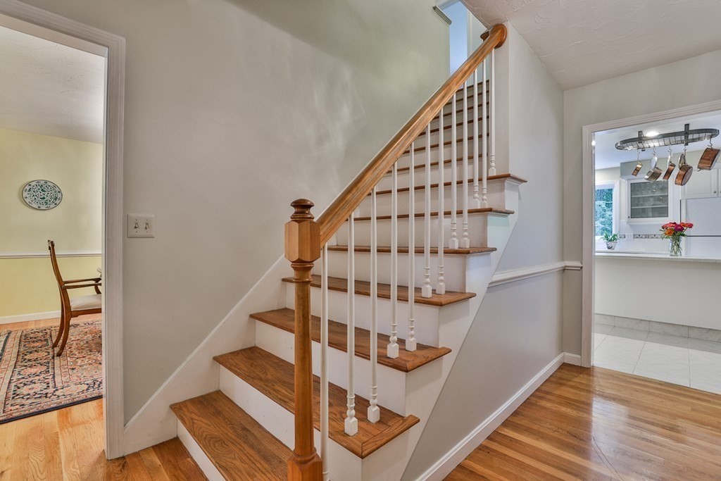100 Stagecoach Road Lancaster, MA 01523 - Photo 14 of 29 a view of entryway with wooden floor and stairs