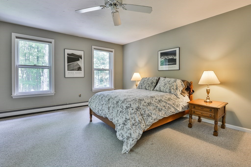 100 Stagecoach Road Lancaster, MA 01523 - Photo 16 of 29 a bedroom with a bed and a window