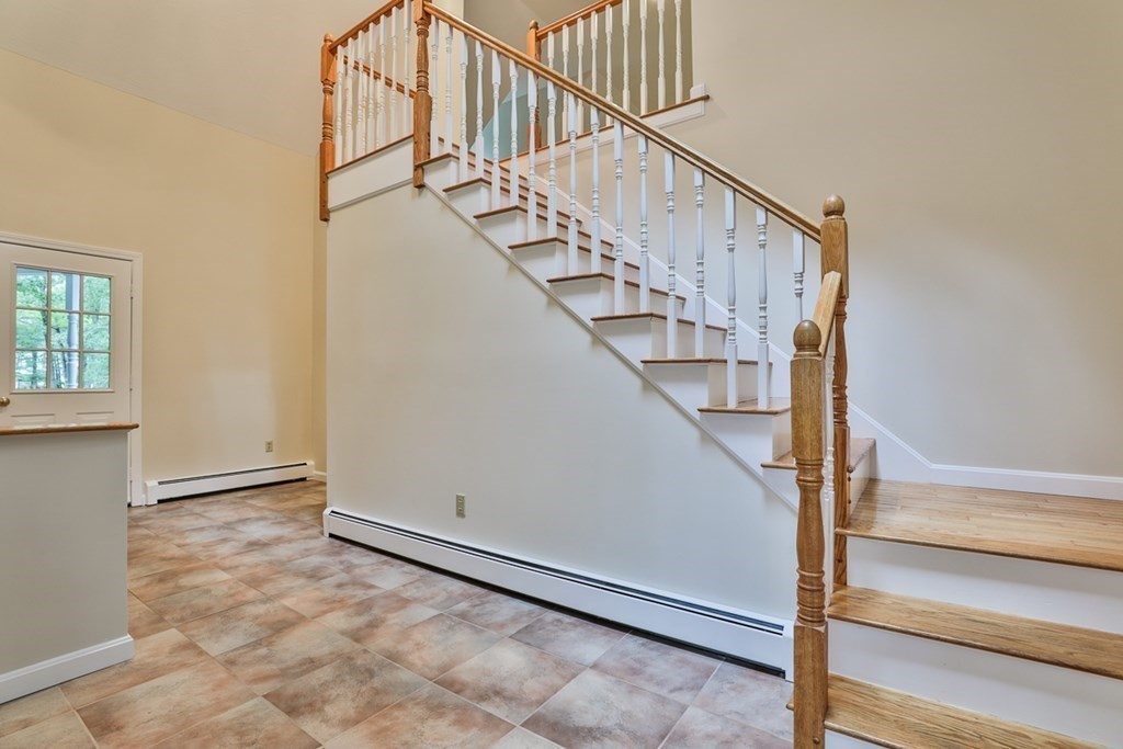 100 Stagecoach Road Lancaster, MA 01523 - Photo 22 of 29 a view of entryway and hall with wooden floor