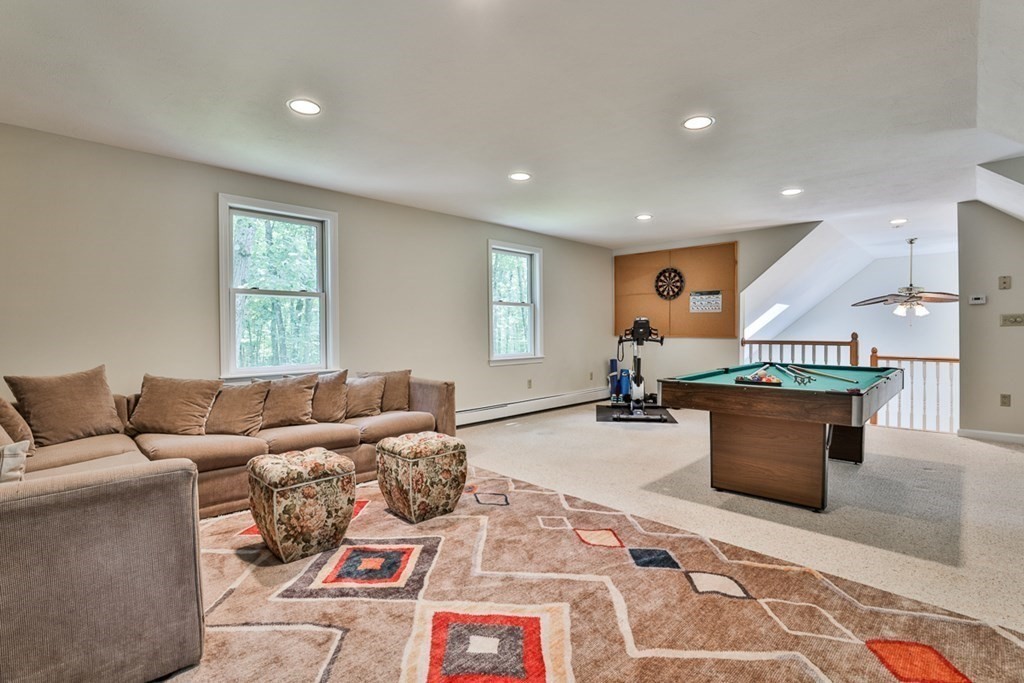 100 Stagecoach Road Lancaster, MA 01523 - Photo 24 of 29 a living room with furniture and a window
