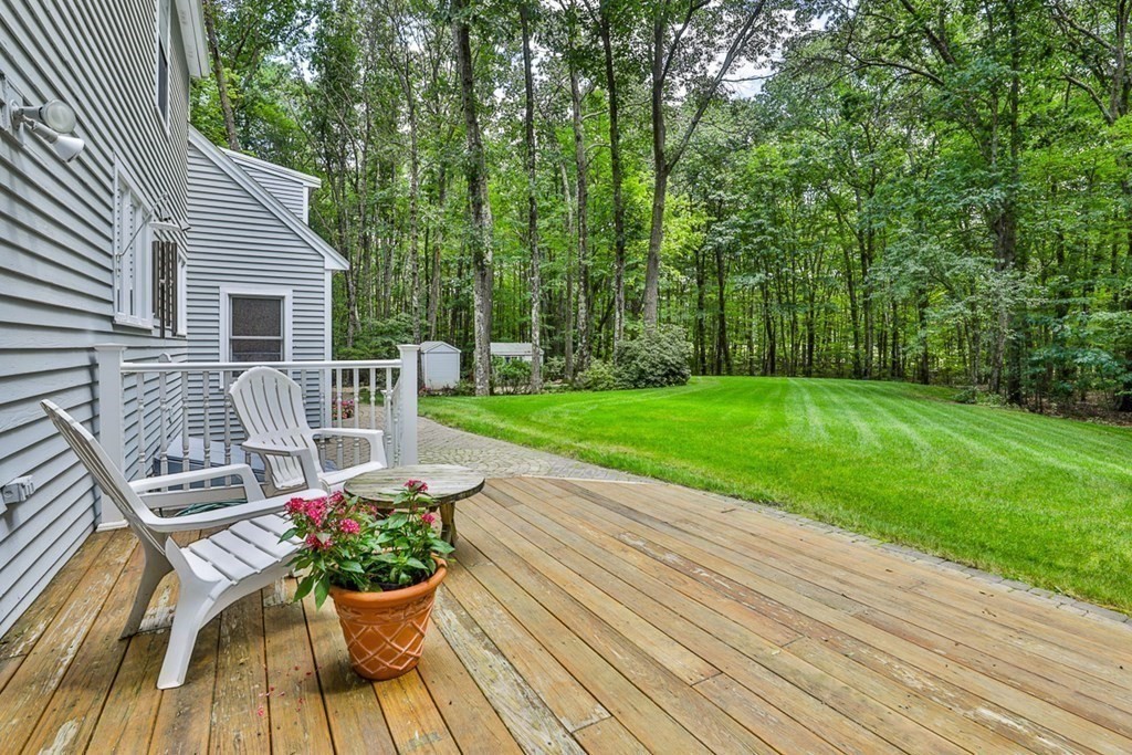 100 Stagecoach Road Lancaster, MA 01523 - Photo 28 of 29 a view of a chair and table on the wooden floor