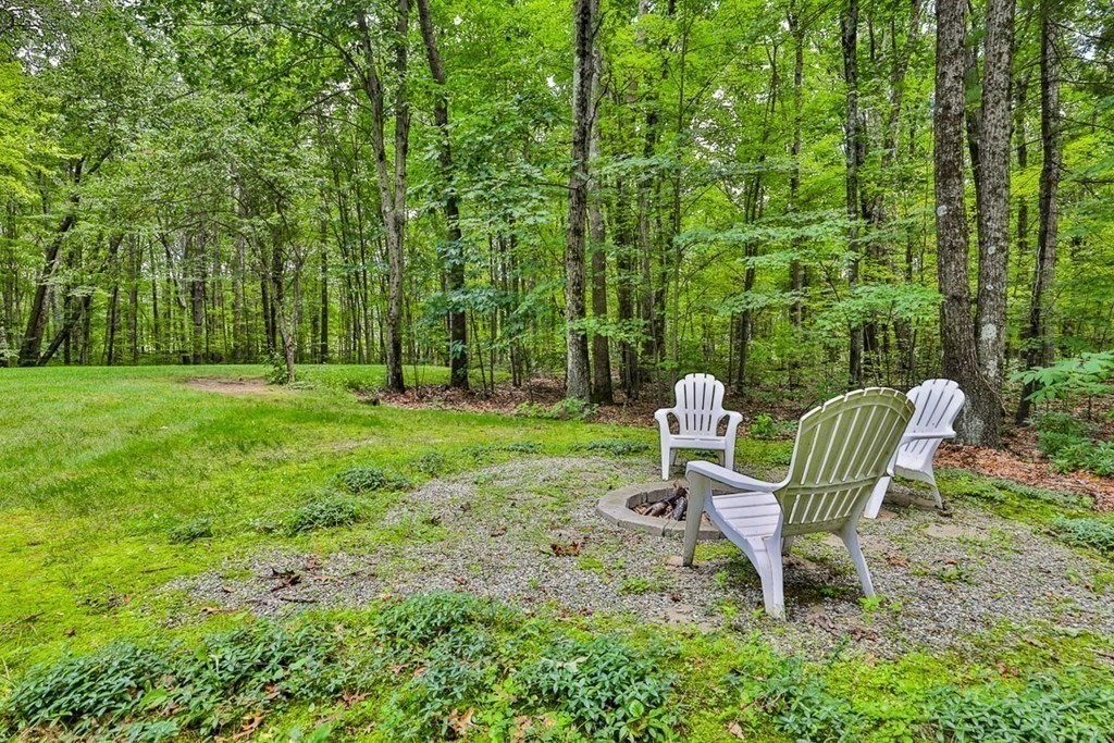 100 Stagecoach Road Lancaster, MA 01523 - Photo 29 of 29 a view of a chair and table in the garden