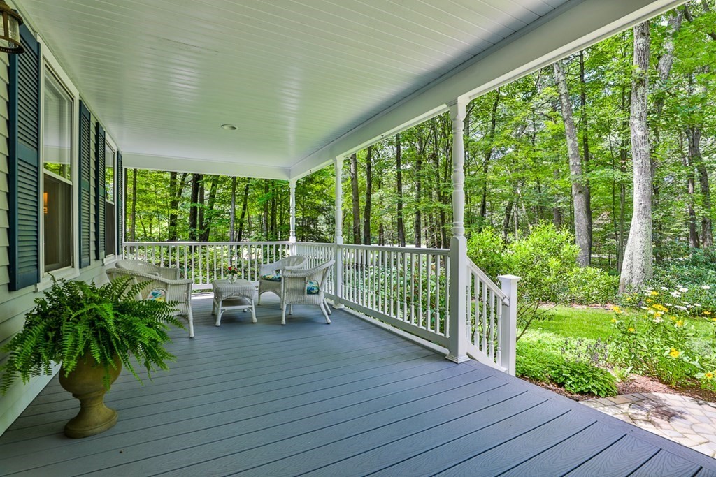 100 Stagecoach Road Lancaster, MA 01523 - Photo 3 of 29 a view of deck with furniture and garden