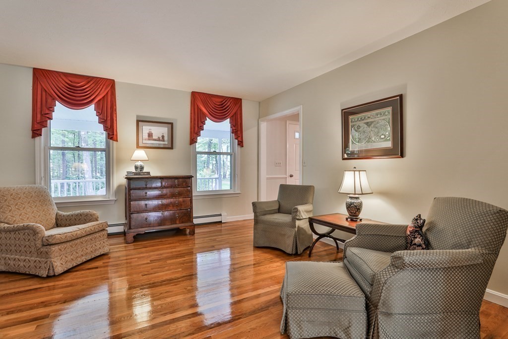 100 Stagecoach Road Lancaster, MA 01523 - Photo 10 of 29 a living room with furniture and wooden floor