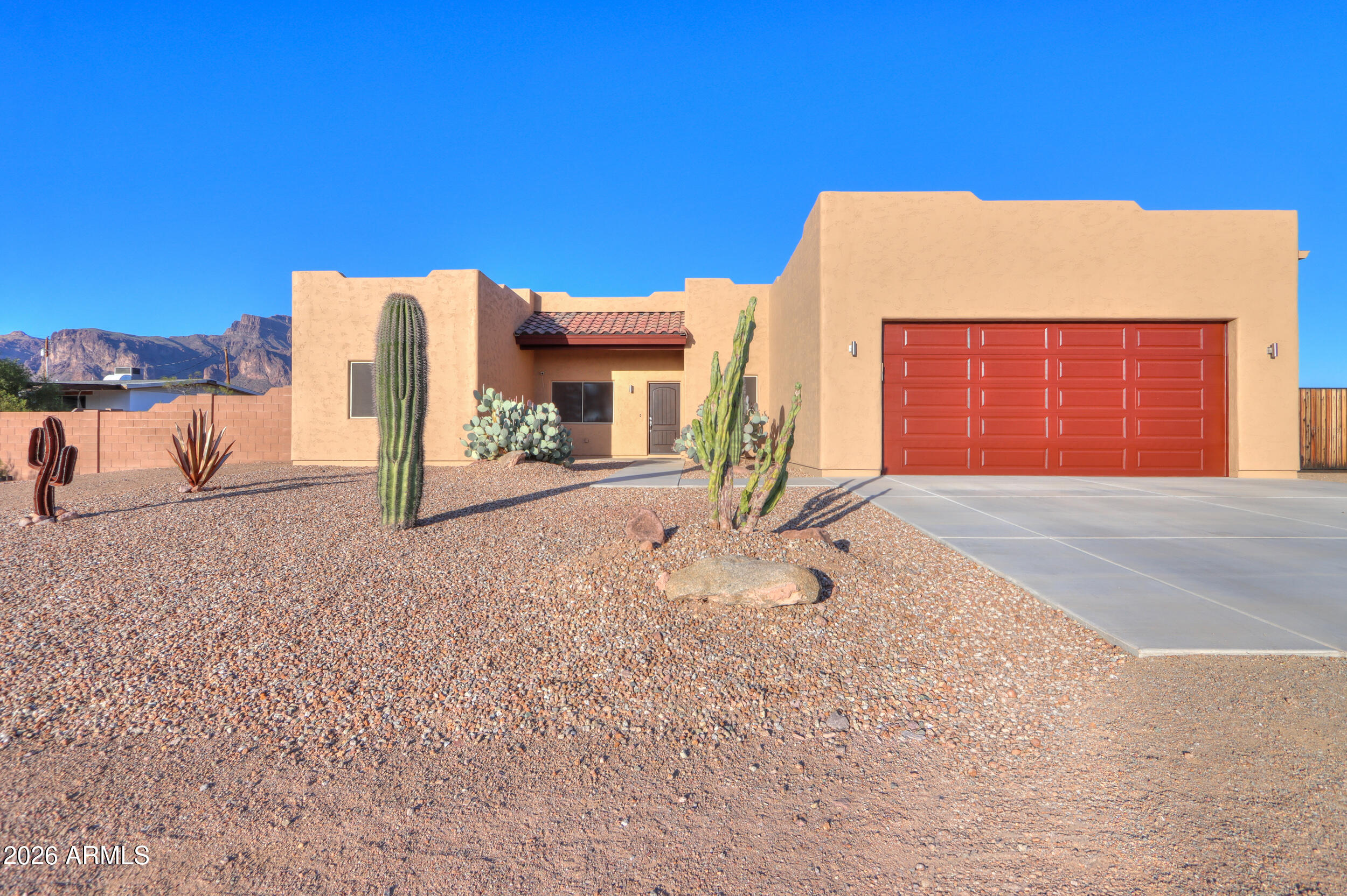 1487 South Mountain View Road Apache Junction, AZ 85119 - Photo 1 of 60 a view of a house with a snow in the background
