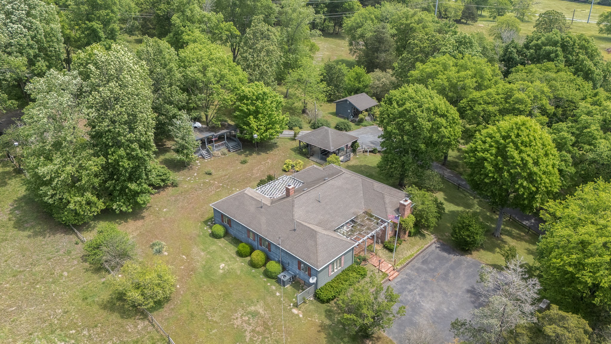 32 Grisham Road Fayetteville, TN 37334 - Photo 8 of 15 an aerial view of a house with a yard basket ball court and outdoor seating