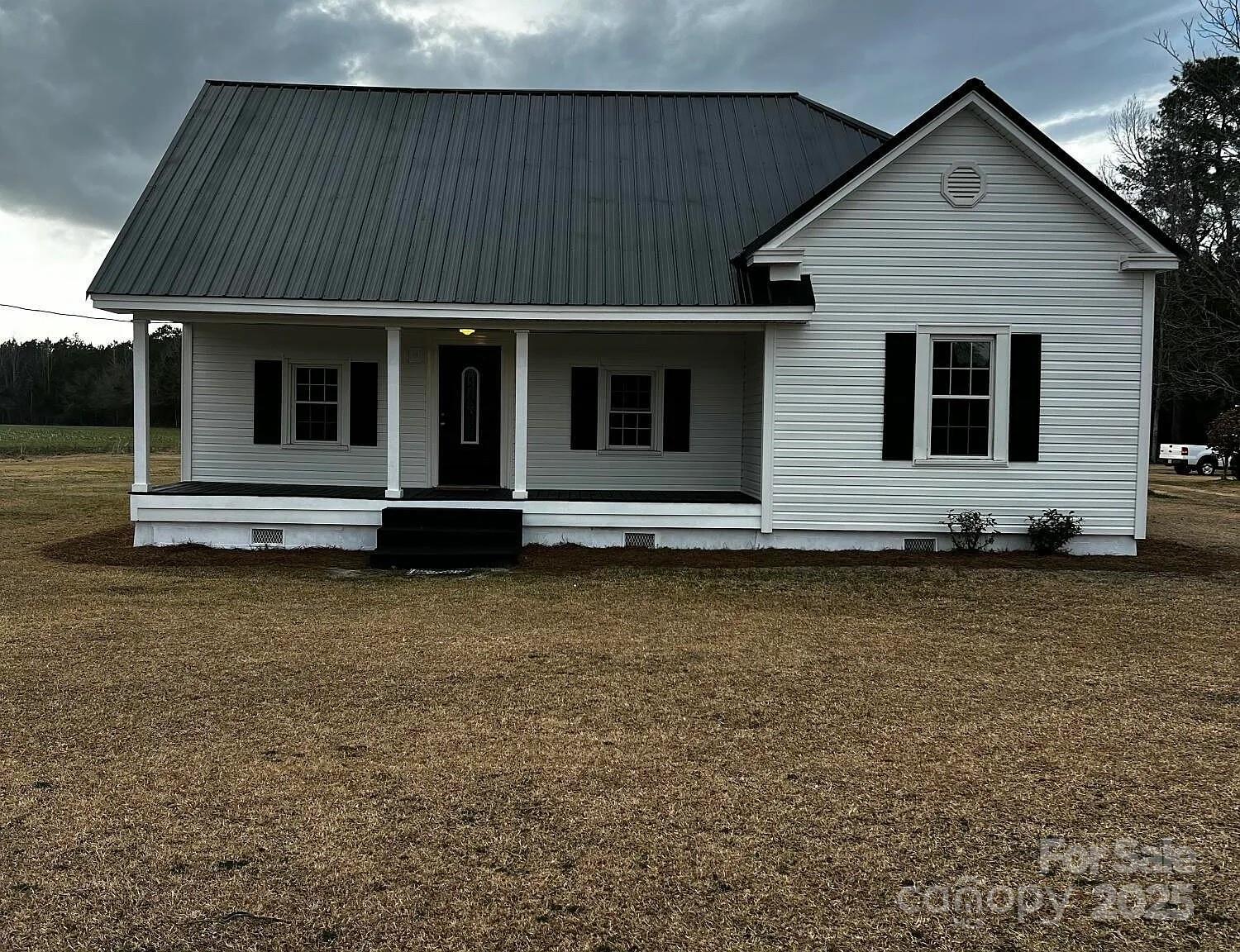 a front view of house with stairs