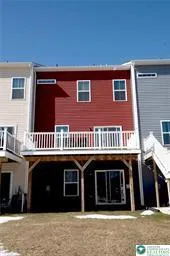 a front view of a building with a garage
