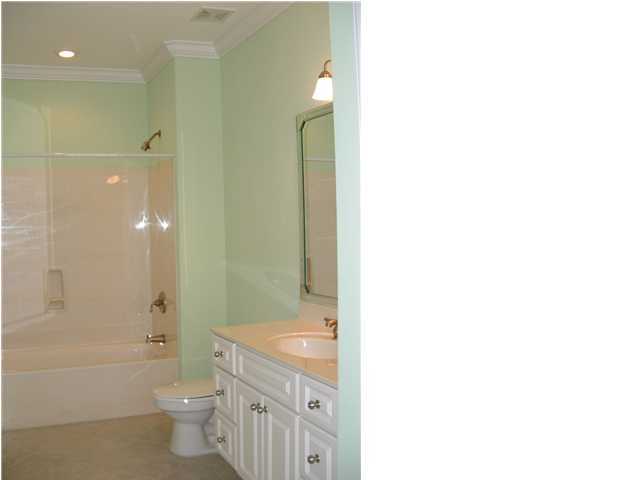 110 Indigo Loop Miramar Beach, FL 32550 - Photo 12 of 15 a bathroom with a granite countertop sink a toilet and shower