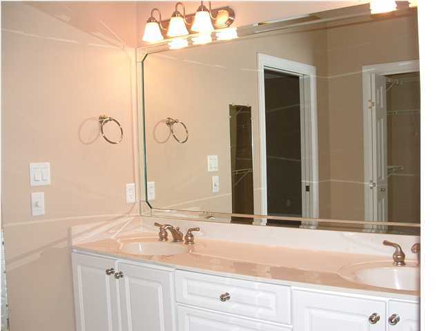 110 Indigo Loop Miramar Beach, FL 32550 - Photo 9 of 15 a bathroom with a sink and a mirror