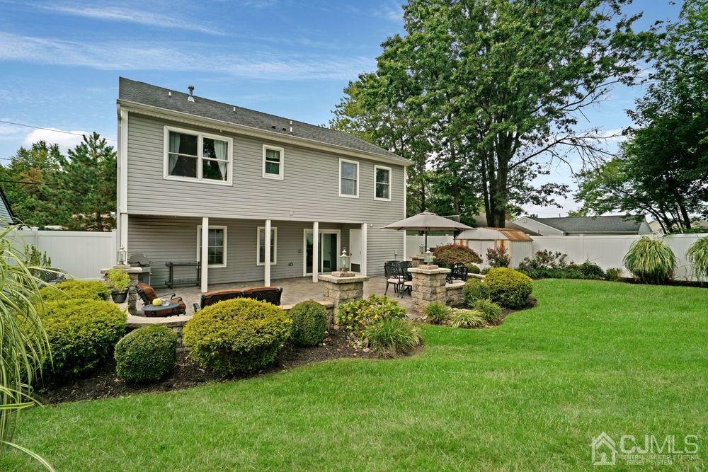 11 Kenmore Road Edison, NJ 08817 - Photo 33 of 40 a front view of house with yard and green space