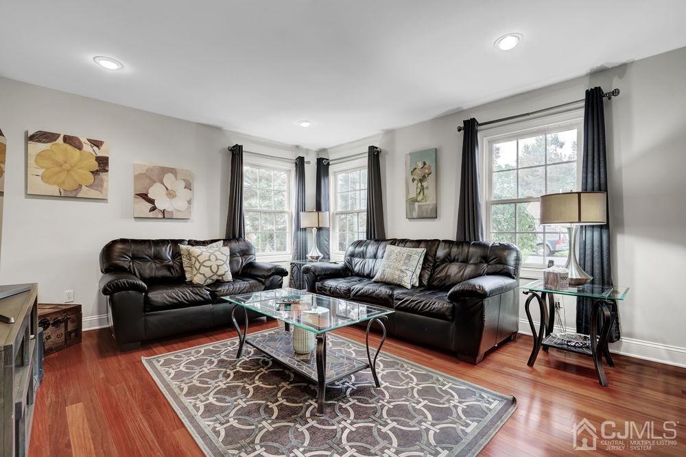 11 Kenmore Road Edison, NJ 08817 - Photo 6 of 40 a living room with furniture wooden floor and a large window