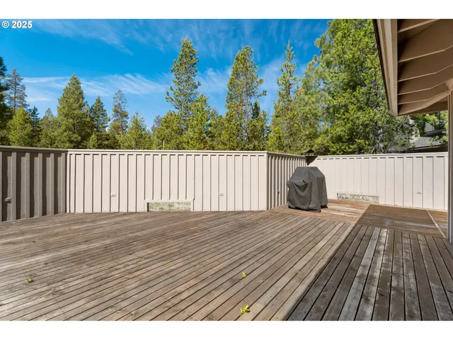 a front view of a house with a yard and a garage