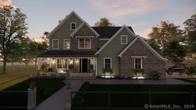 a front view of house with yard and green space