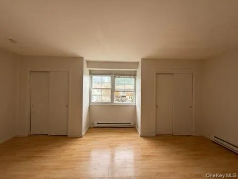 an empty room with window