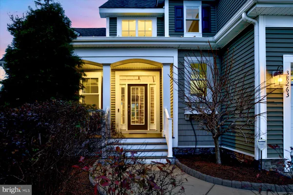 a view of a house with a street