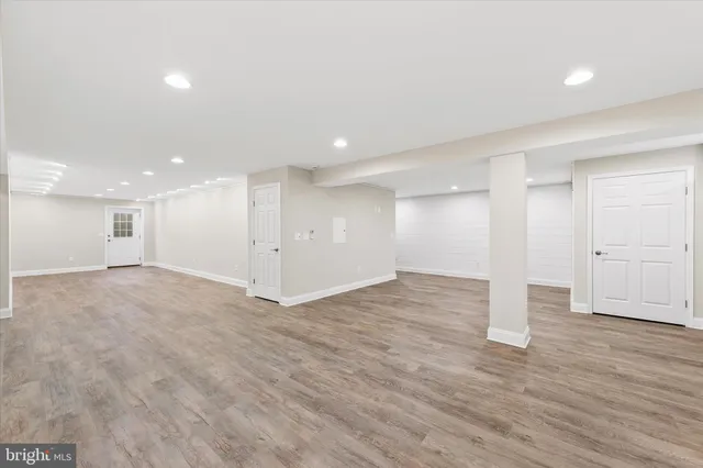 a kitchen that has a stove and a sink