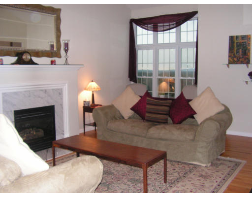 40 Scenic Road Westfield, MA 01085 - Photo 11 of 14 a living room with furniture and a fireplace