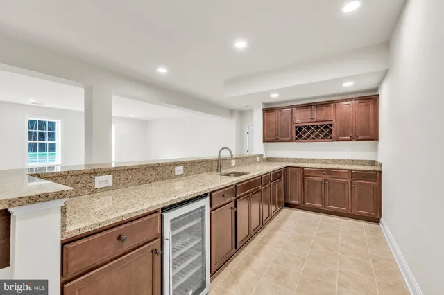 a view of a bathroom from a hallway with toilet
