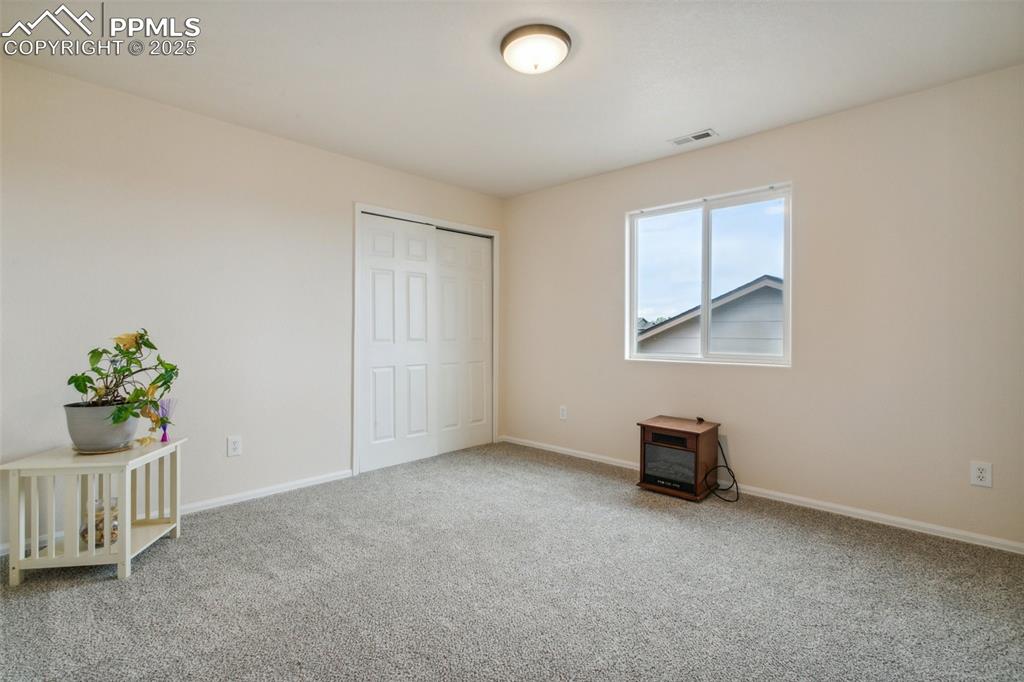 12229 Crystal Downs Road Peyton, CO 80831 - Photo 35 of 47 a view of a livingroom with a furniture