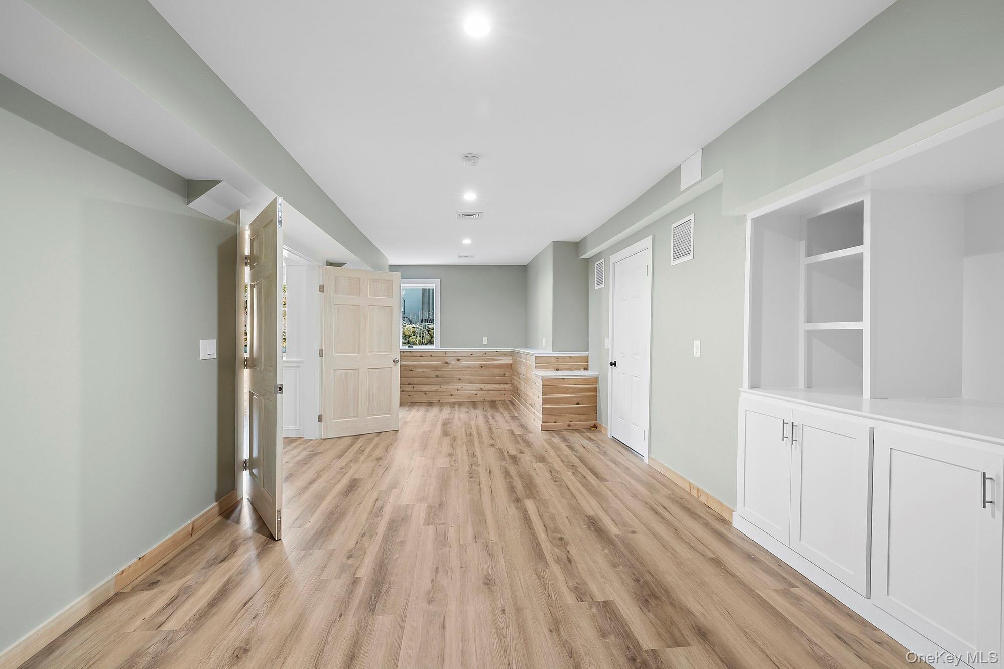 178 Main Road Riverhead, NY 11901 - Photo 23 of 28 a view of a room with wooden floor