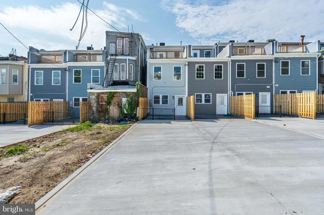 a view of a building with a street