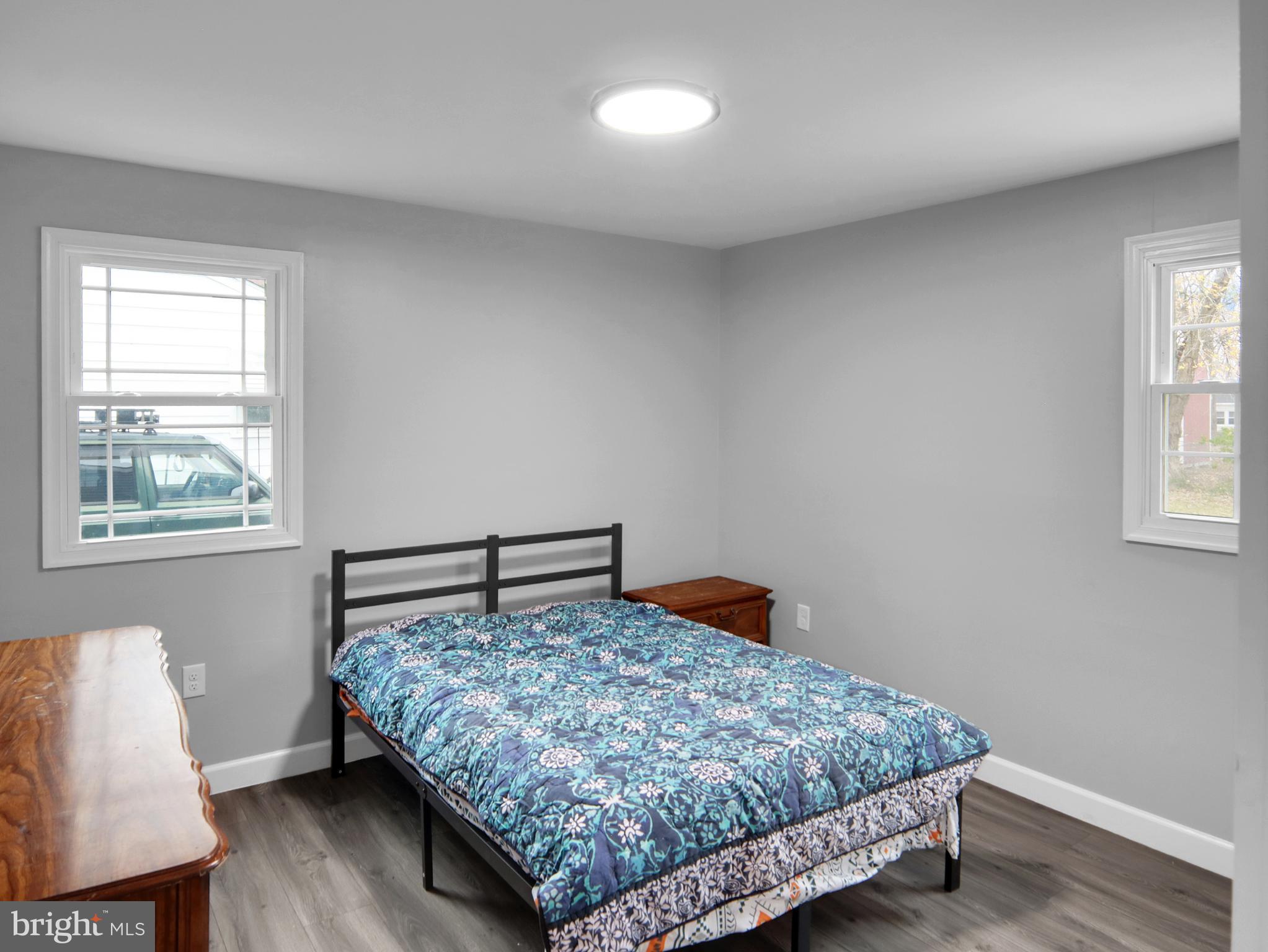 125 Valley Road Aberdeen, MD 21001 - Photo 11 of 24 a bedroom with a bed and wooden floor