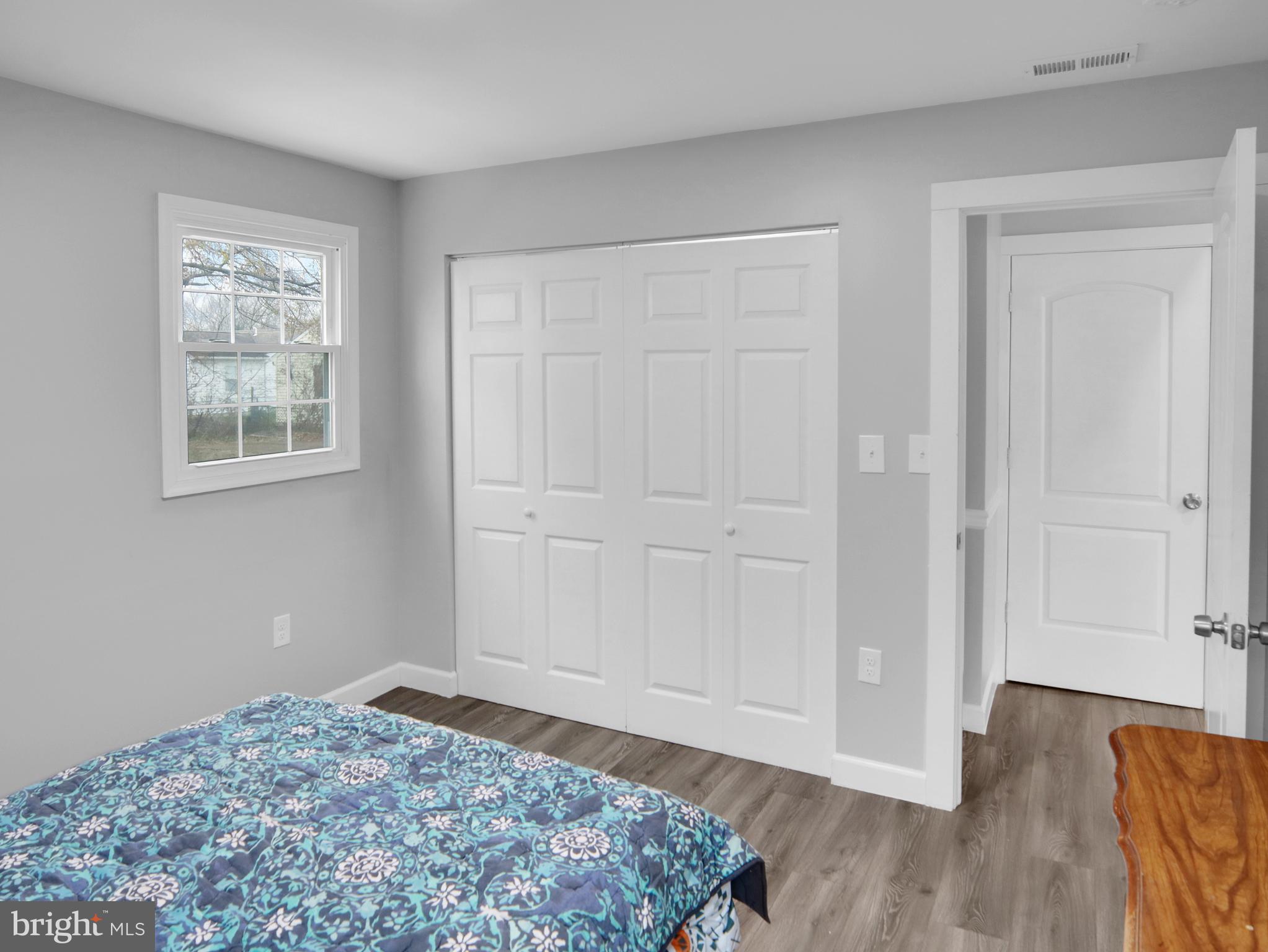 125 Valley Road Aberdeen, MD 21001 - Photo 12 of 24 a view of a bedroom with wooden floor and closet