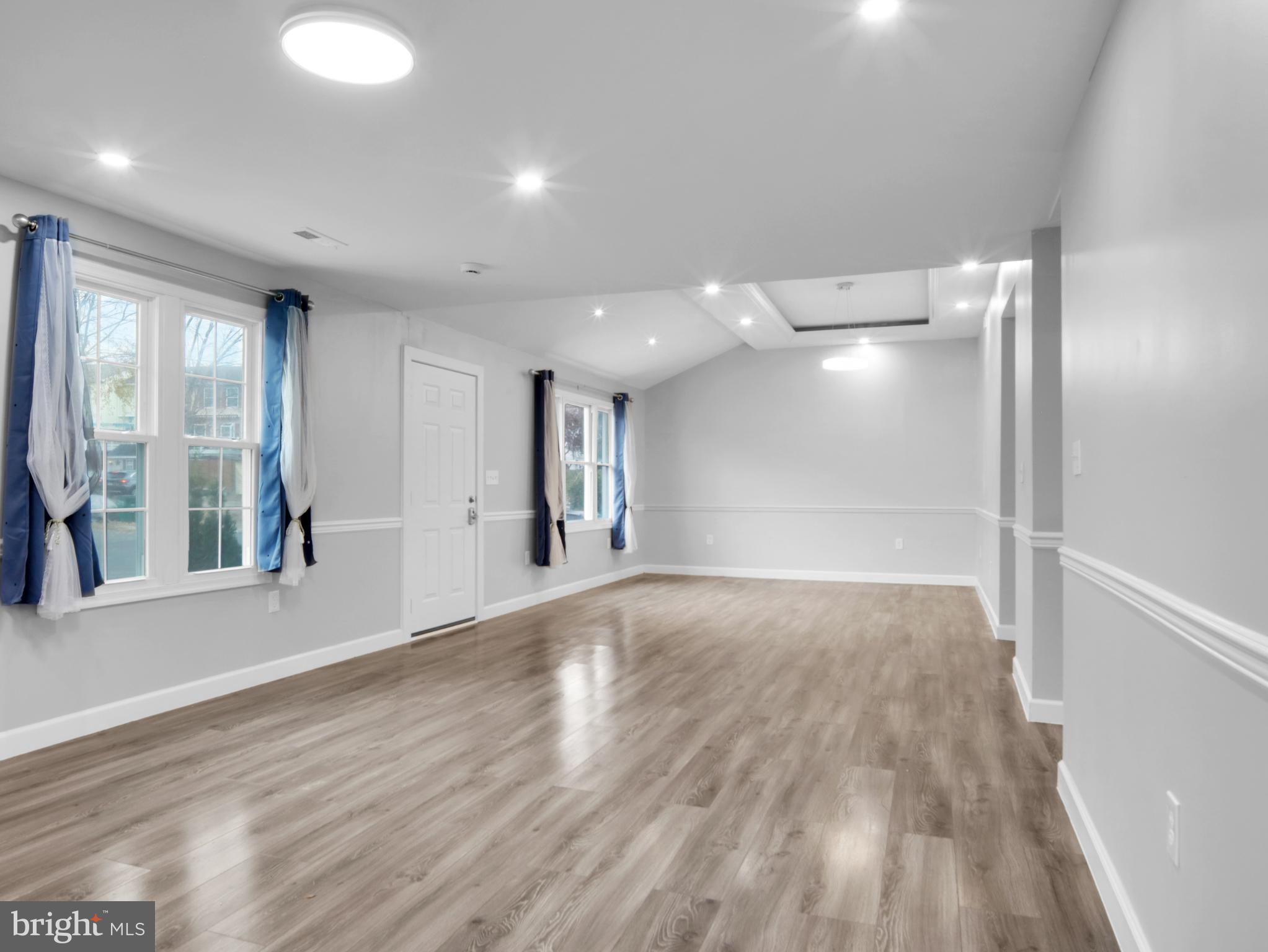 125 Valley Road Aberdeen, MD 21001 - Photo 15 of 24 a view of an empty room with wooden floor and a window