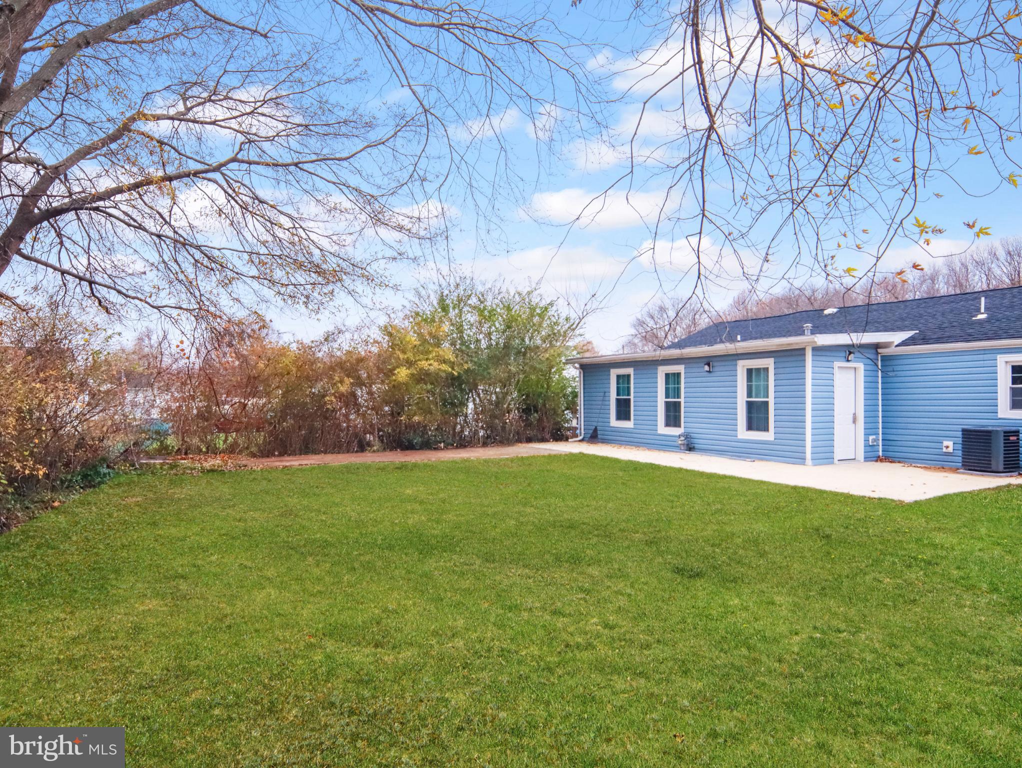 125 Valley Road Aberdeen, MD 21001 - Photo 7 of 24 a front view of a house with a garden