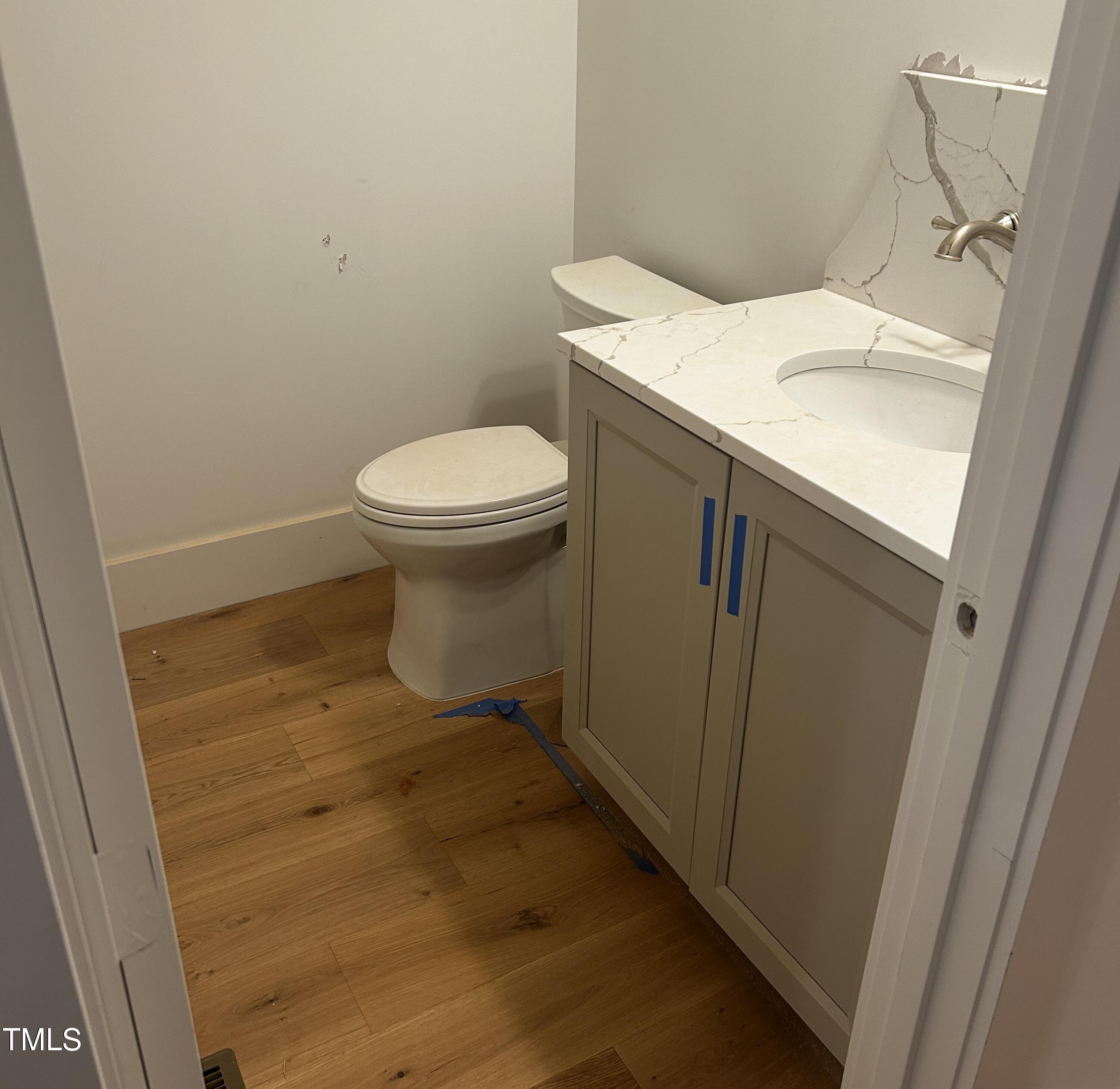 1008 Frank Bailey Road Wake Forest, NC 27587 - Photo 16 of 22 a bathroom with a sink and toilet