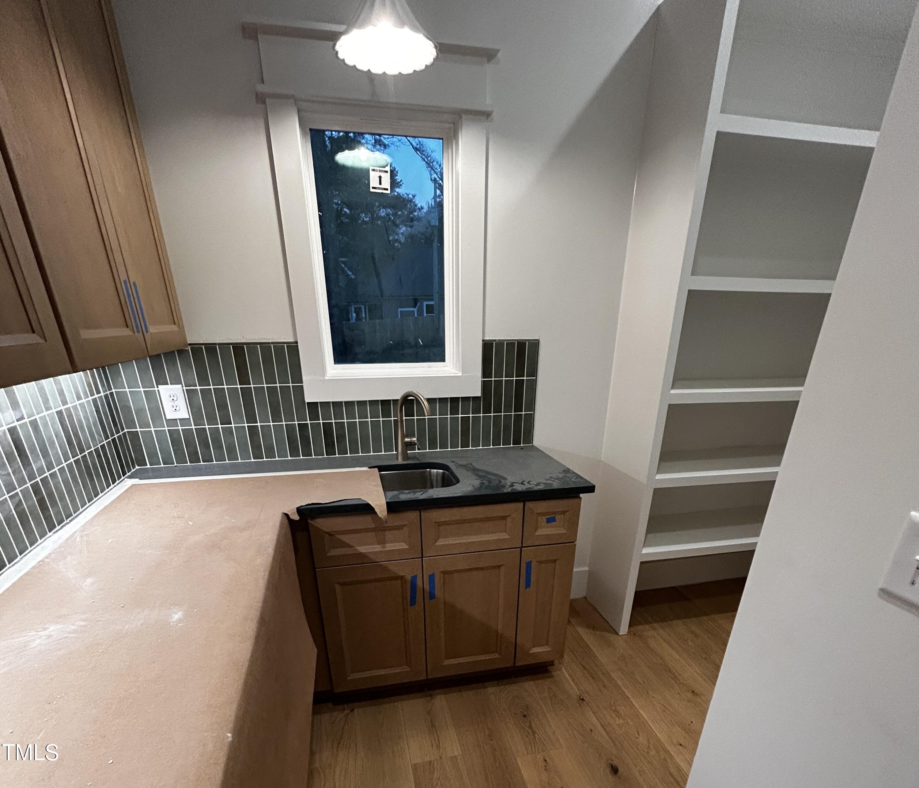 1008 Frank Bailey Road Wake Forest, NC 27587 - Photo 5 of 22 a bathroom with a sink and a mirror