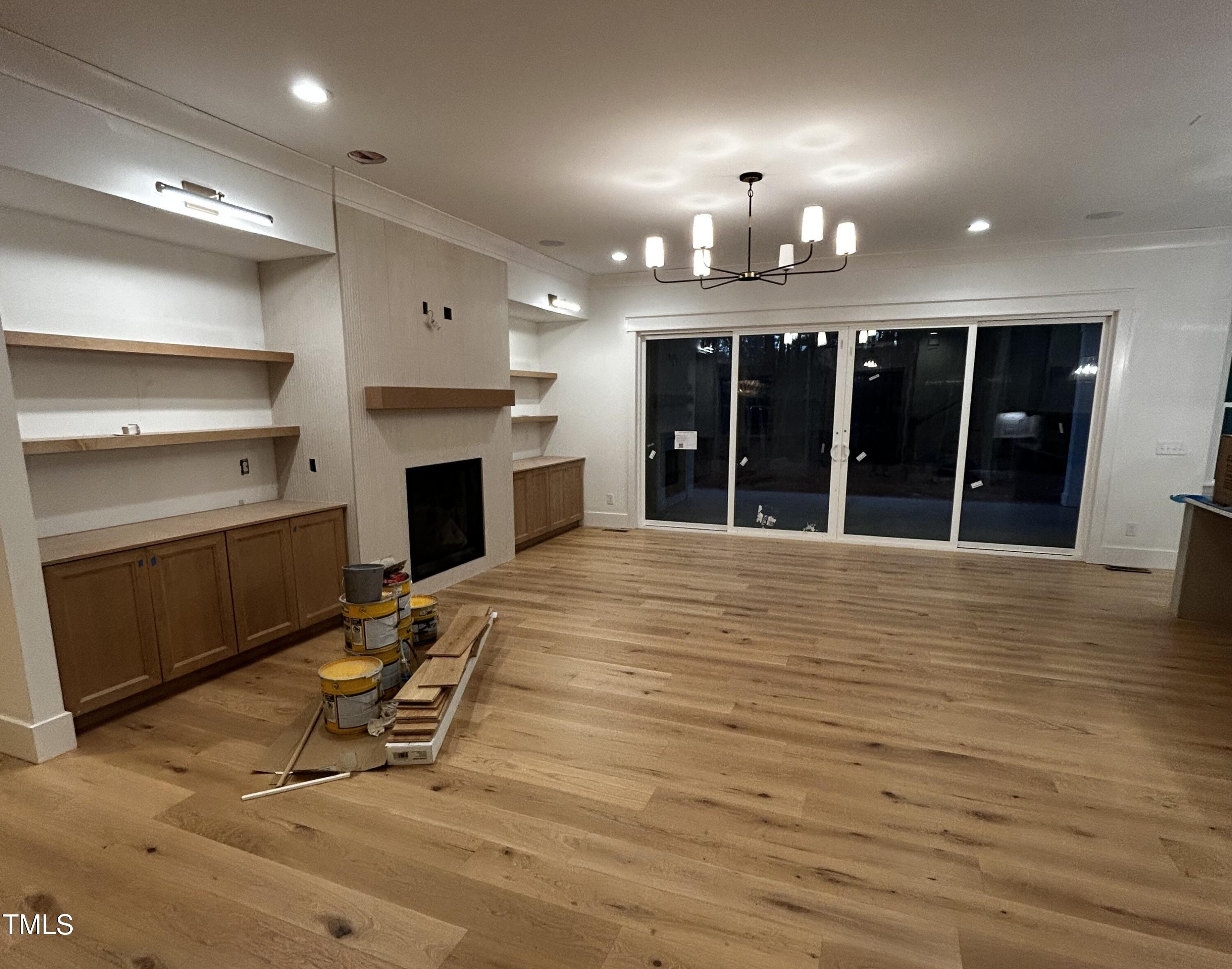 1008 Frank Bailey Road Wake Forest, NC 27587 - Photo 9 of 22 a view of a room with furniture and a fireplace