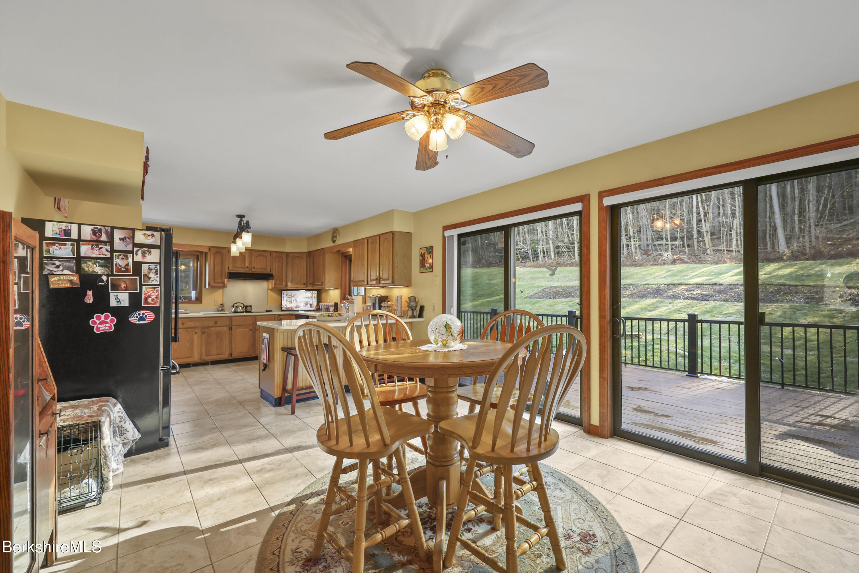551 Tamarack Road Pittsfield, MA 01201 - Photo 12 of 51 a dining room with furniture and a floor to ceiling window